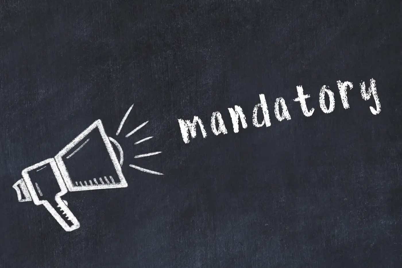 A chalkboard with a megaphone drawn onto it with the word “mandatory” in front of it in white chalk.