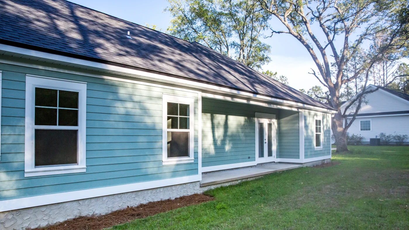 A home with blue siding and white trim
