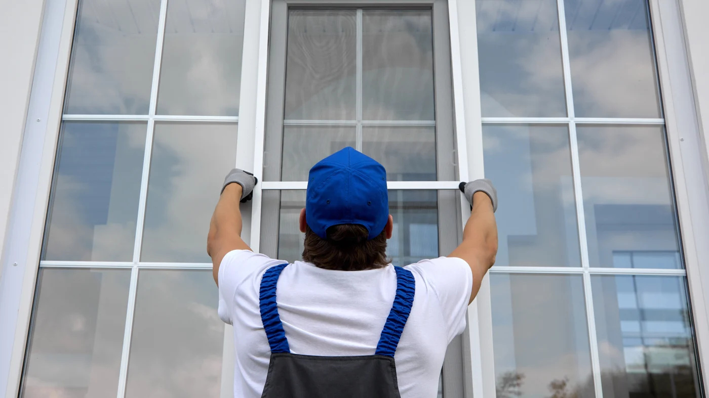 An installer completes a replacement window project