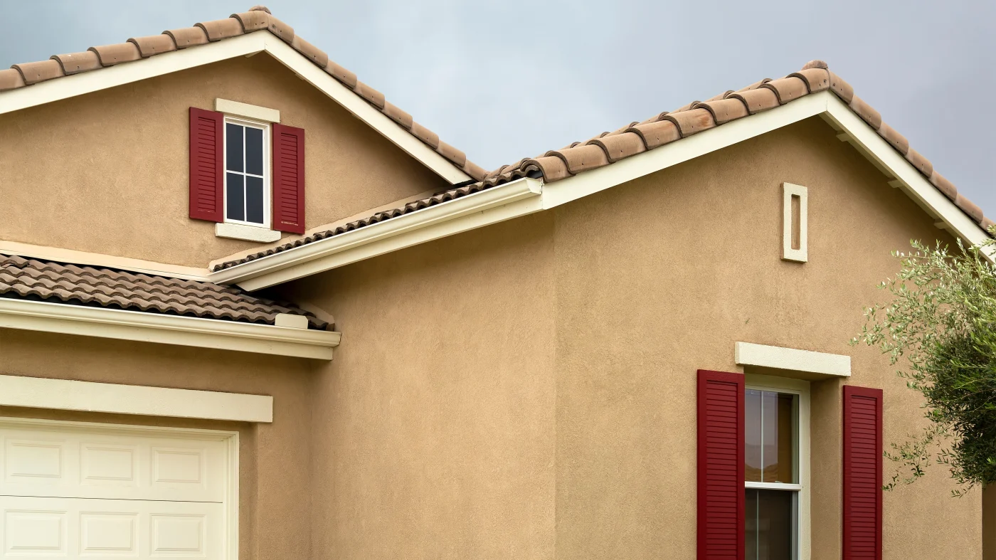 A home with brown stucco siding