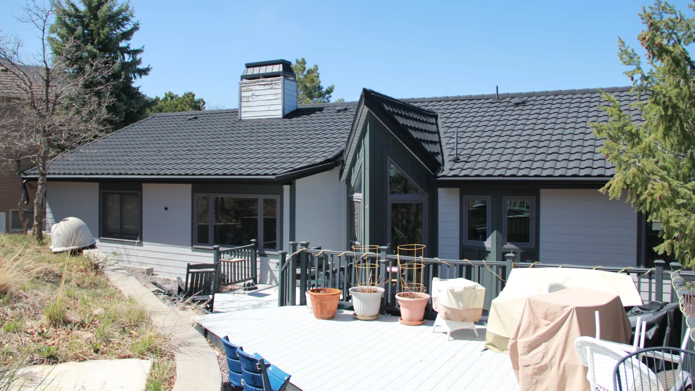 A home with gray siding and black trim