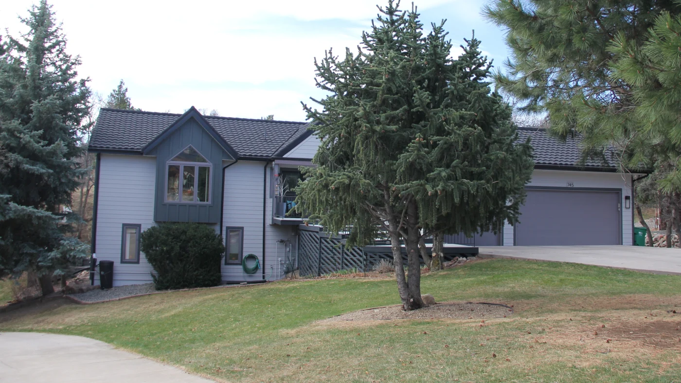 A home with gray siding