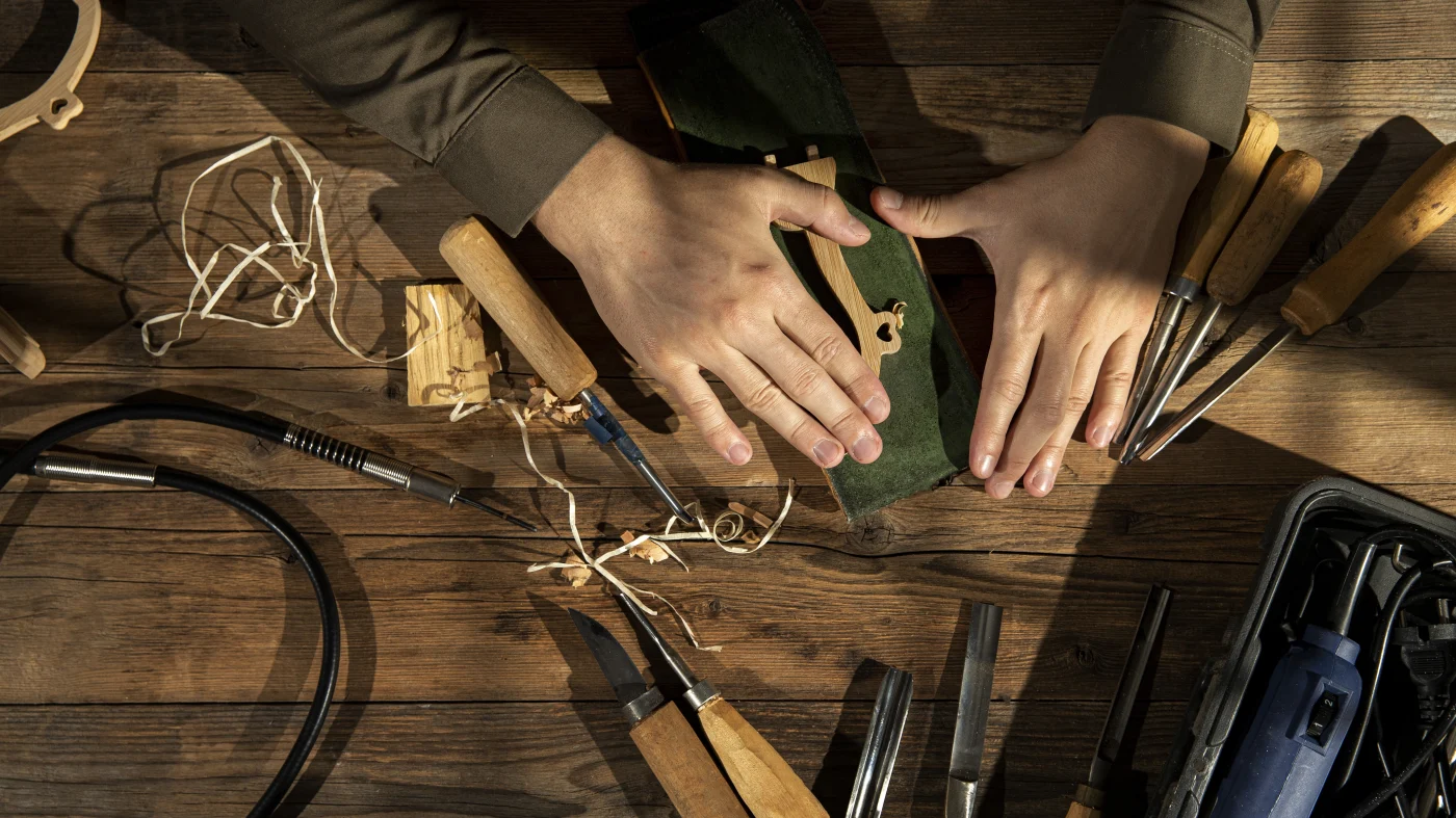 A skilled artisan works with their tools of trade