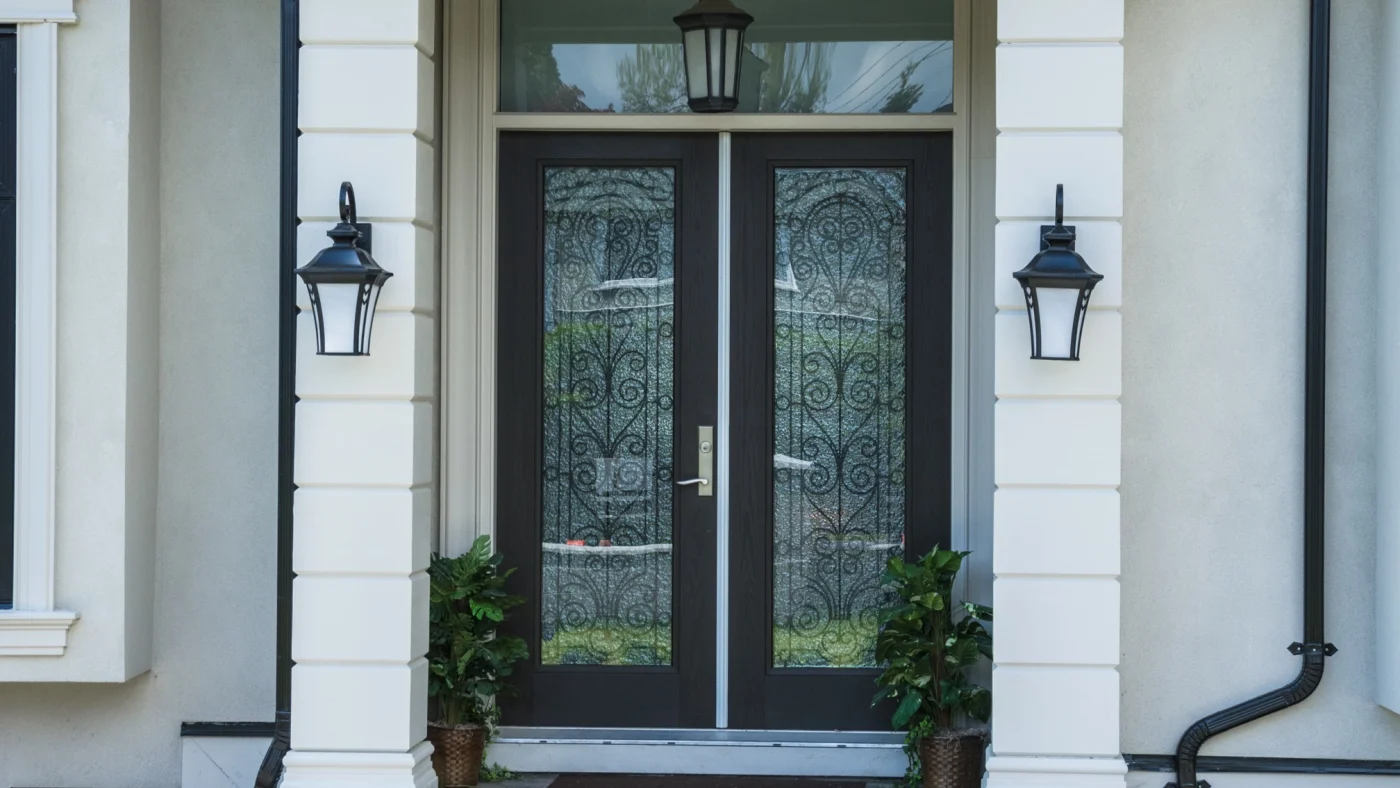 This is a stylish, secure door with a black base color that makes the house look new.