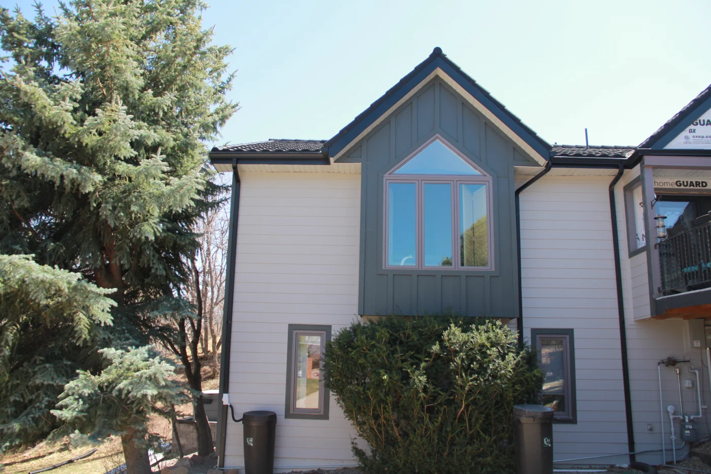 Large house with brand new windows and siding