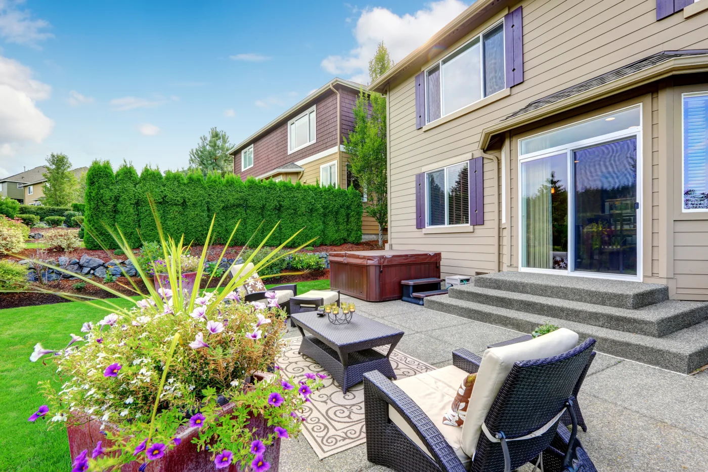 An outdoor living area with a sliding patio door