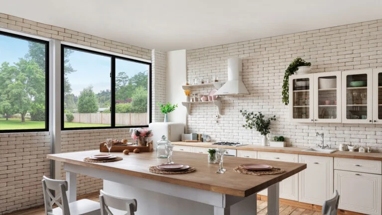 A kitchen with black sliding windows