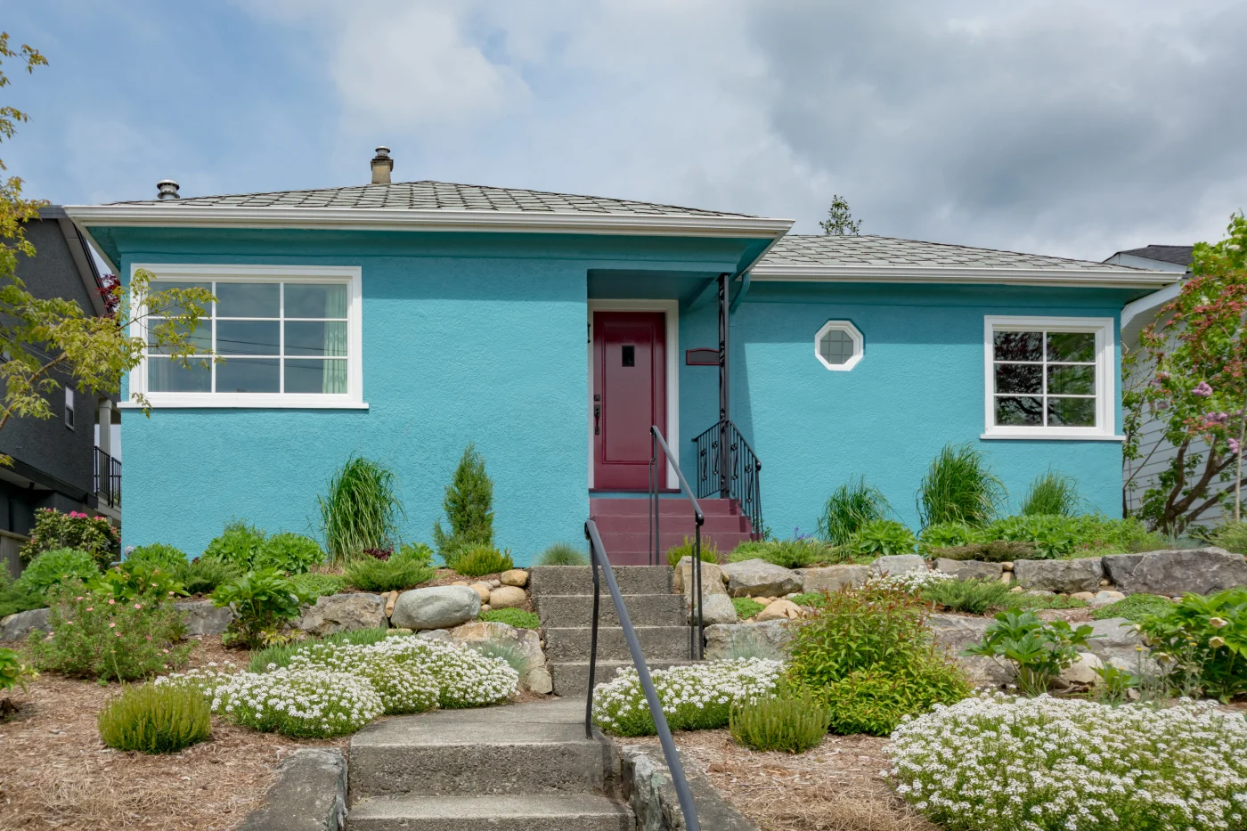 Light Blue Average Residential House Built On Land Terrace